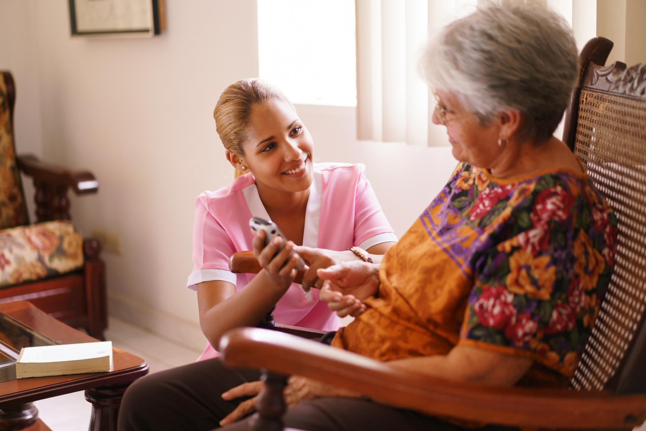 Hospice Nurse Helps Old Lady With Mobile Phone Call Necsy SRL